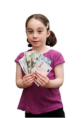 Image showing Smiling cute girl holds a fan of banknotes isolated