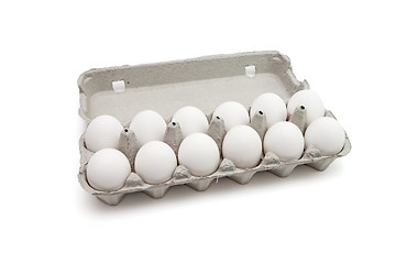 Image showing Twelve eggs in a paper box isolated