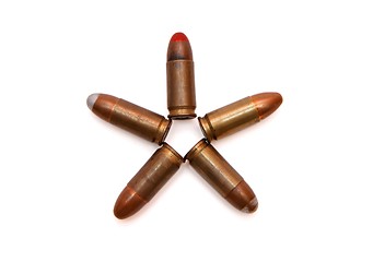 Image showing Five-pointed star made of 9mm Parabellum cartridges isolated