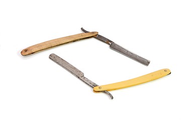 Image showing Two vintage rusty razors isolated