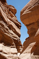 Image showing Narrow slot between two rocks in desert canyon