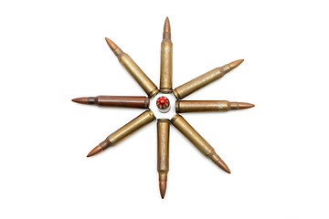 Image showing Eight-pointed star made of 5.56mm rifle cartridges isolated