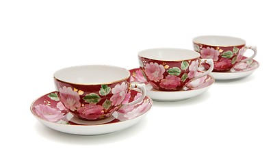 Image showing Three beautiful  tea cups with saucers isolated