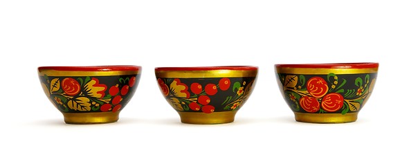 Image showing Three painted Russian wooden cups isolated