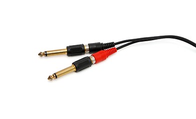 Image showing Golden headphone plug with black wire isolated 