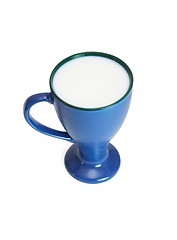 Image showing High blue cup full of milk isolated