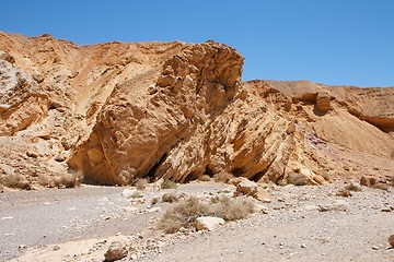 Image showing Orange rocks in stony desert