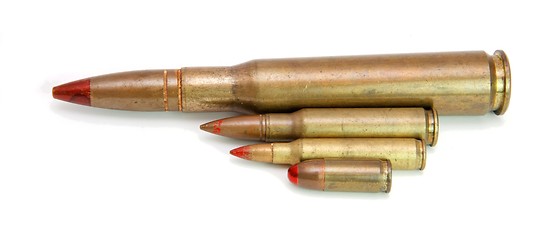 Image showing Four red-tipped tracer cartridges of various calibers isolated