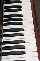 Image showing Black and white keys of old piano closeup