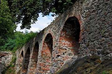 Image showing Red brick arches of medieval castle