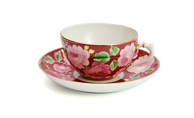 Image showing Tea cup and saucer with floral pattern isolated 