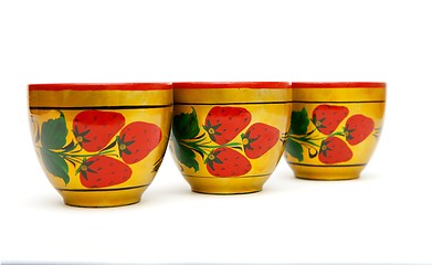 Image showing Three painted Russian  wooden cups  isolated