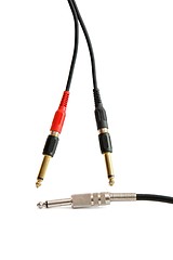 Image showing Red, black, silver and golden headphone plugs isolated 