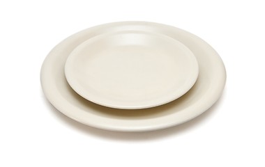 Image showing Plain beige dinner plate and  saucer isolated