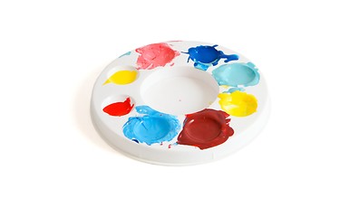 Image showing Round kids palette with colorful paints isolated