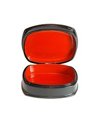 Image showing Open oval black casket with red lining isolated