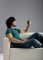 Image showing Talking at cellphone