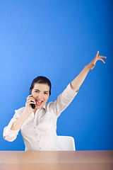 Image showing Happy woman calling at phone