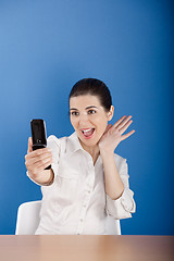 Image showing Happy woman calling at phone