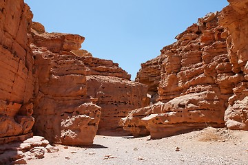 Image showing Desert landscape of weathered red rocks