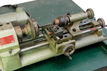 Image showing Small metal lathe isolated closeup 