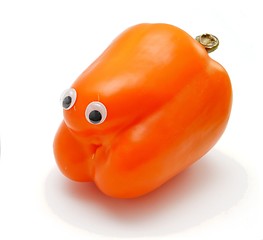 Image showing Sweet orange bell pepper with eyes isolated