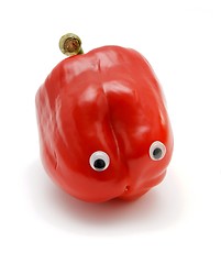 Image showing Sweet red bell pepper with eyes isolated