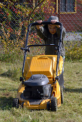 Image showing mowing grass