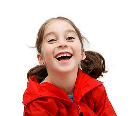 Image showing Laughing seven years girl with pigtails isolated
