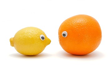 Image showing Funny lemon and orange with eyes isolated