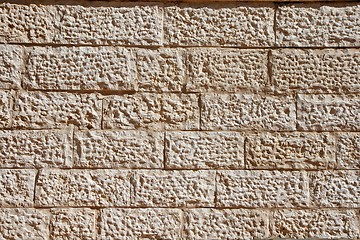 Image showing Rough beige stone wall blocks texture