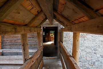 Image showing Wooden gallery in ancient peasant house 