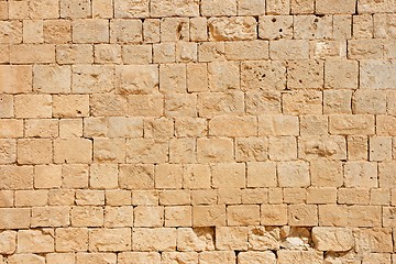 Image showing Ancient golden stone block wall texture