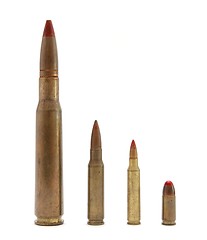 Image showing Four red-tipped tracer cartridges of various calibers isolated