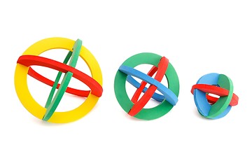 Image showing Colorful toy spherical models made of rubber rings isolated 