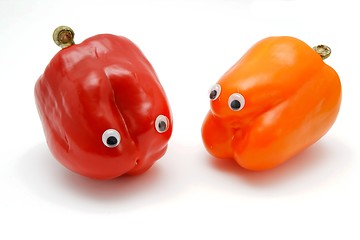 Image showing Two sweet bell peppers with eyes isolated