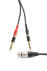 Image showing Red, black, silver and golden headphone plugs isolated 