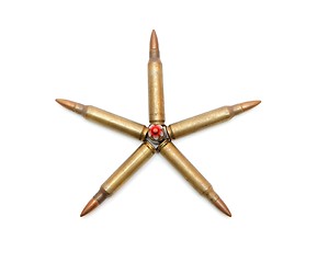 Image showing Five-pointed star made of 5.56mm M16 assault rifle cartridges isolated