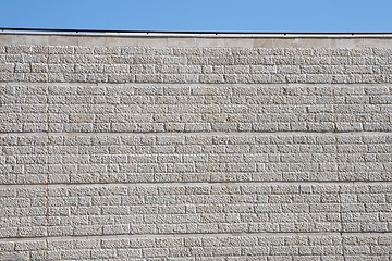 Image showing Beige rough stone wall texture