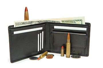 Image showing Black wallet, money and cartridges  isolated