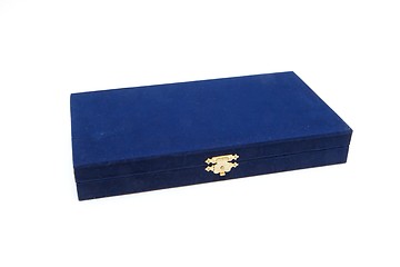 Image showing Closed dark blue velvet casket with golden lock isolated