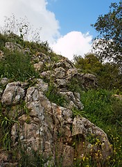 Image showing Rocky hill slope in a cloudy day
