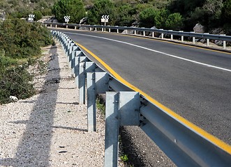 Image showing Road with guardrail closeup in perspective