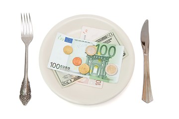 Image showing Bills and coins on the plate