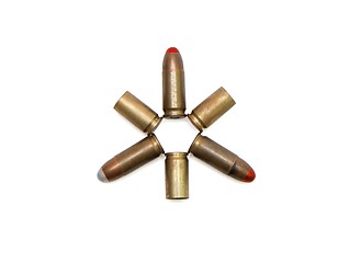 Image showing Star made of 9mm Parabellum cartridges and spent cases isolated