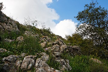 Image showing Rocky hill slope in a cloudy day