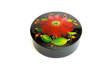 Image showing Oval black casket with flower pattern isolated