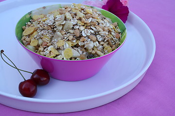 Image showing Fruit muesli and cherries