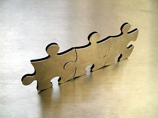 Image showing Three jigsaw team