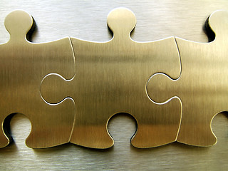 Image showing Golden jigsaw